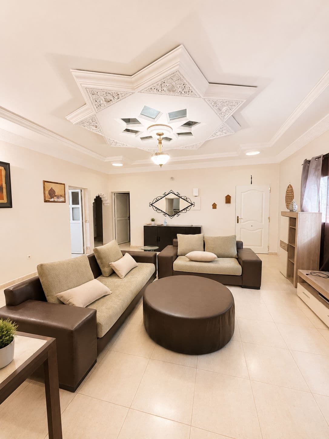 Appartement Spacieux 2 Chambres à l’Îlot K | Double Salon, Terrasse & Garage Sécurisé