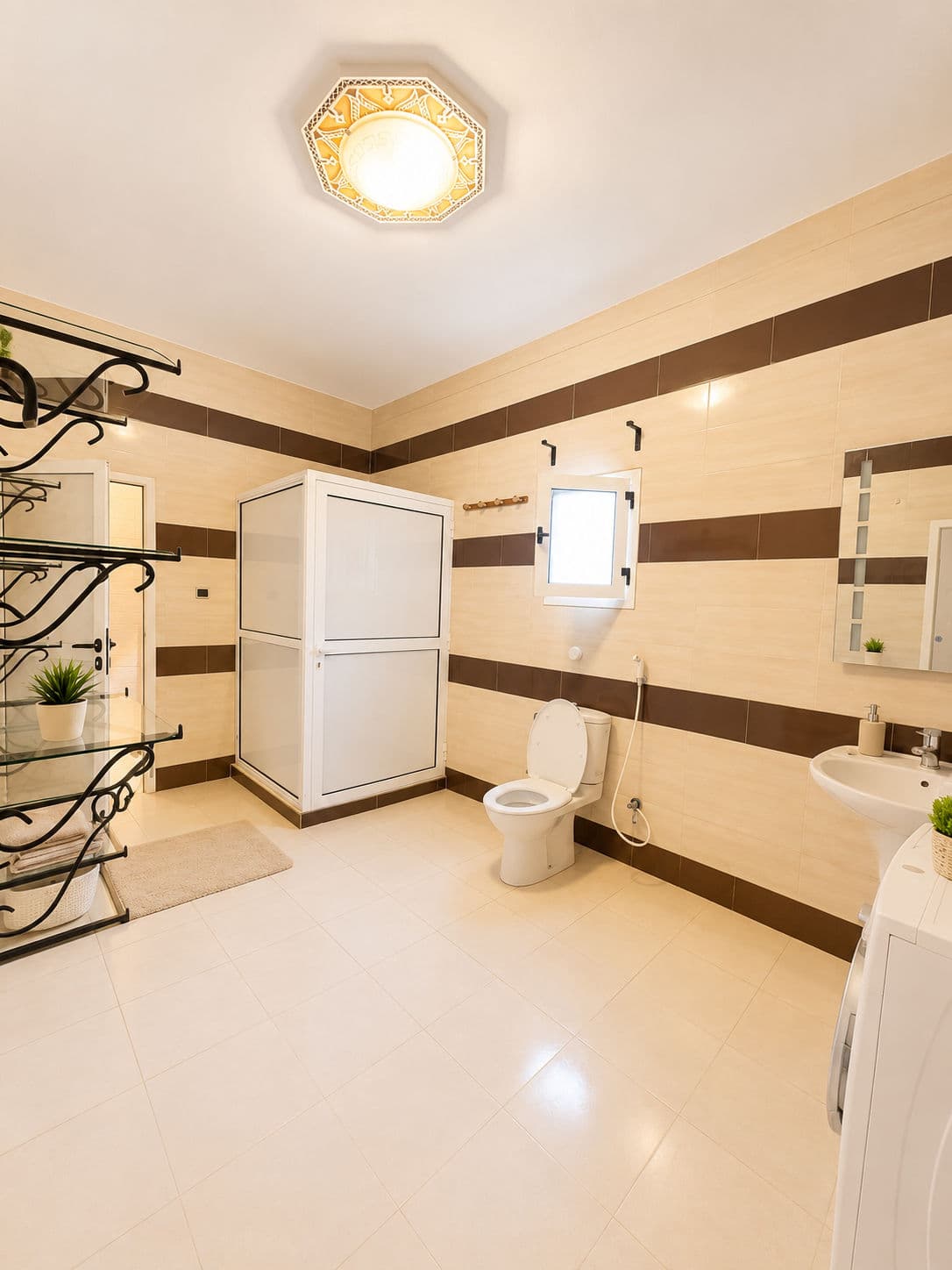 Appartement Spacieux 2 Chambres à l’Îlot K | Double Salon, Terrasse & Garage Sécurisé 10