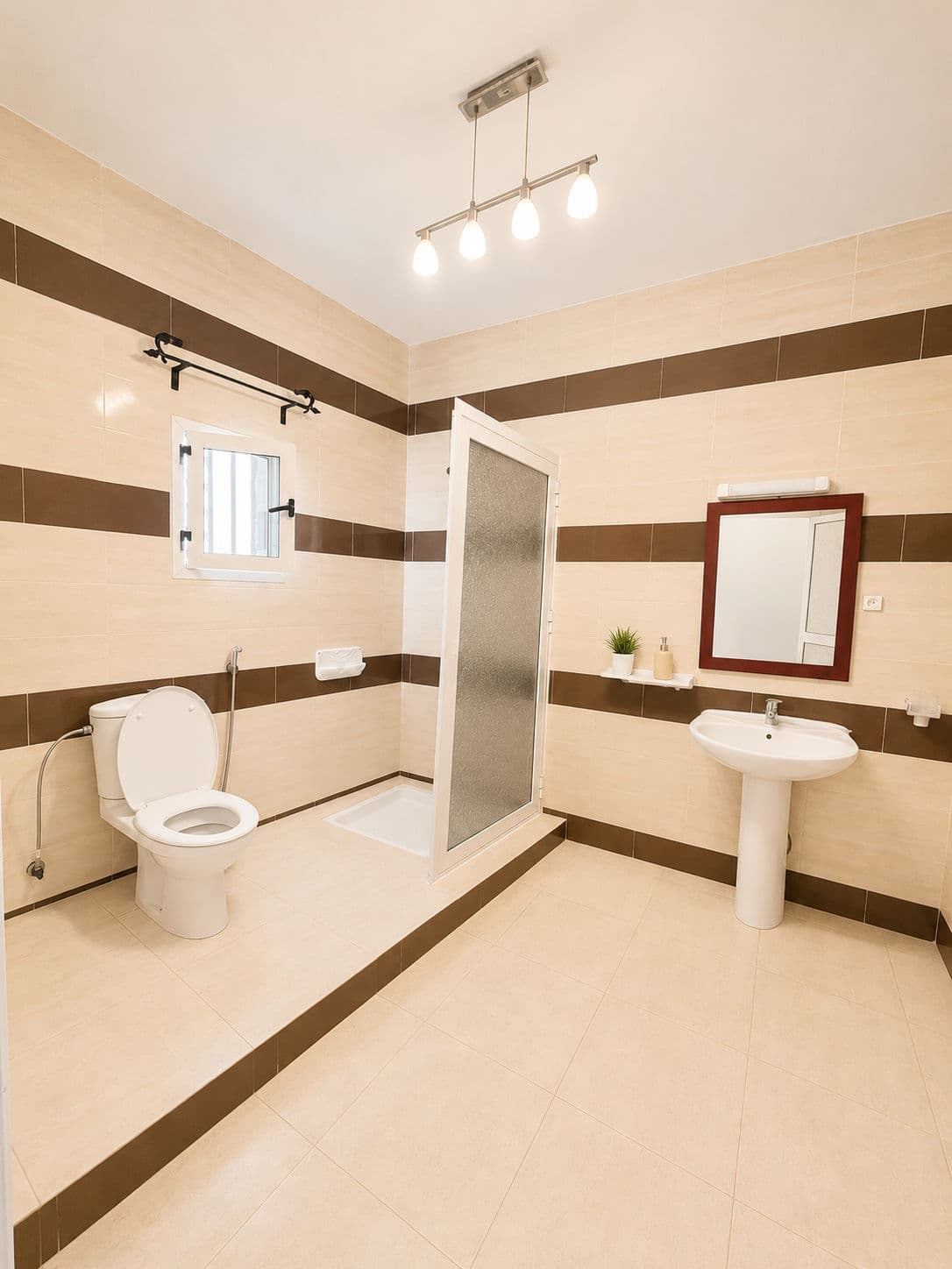 Appartement Spacieux 2 Chambres à l’Îlot K | Double Salon, Terrasse & Garage Sécurisé 13